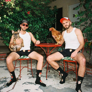 Social media post: Heath and Zane wearing SuperFit boxer briefs sitting in a garden. 