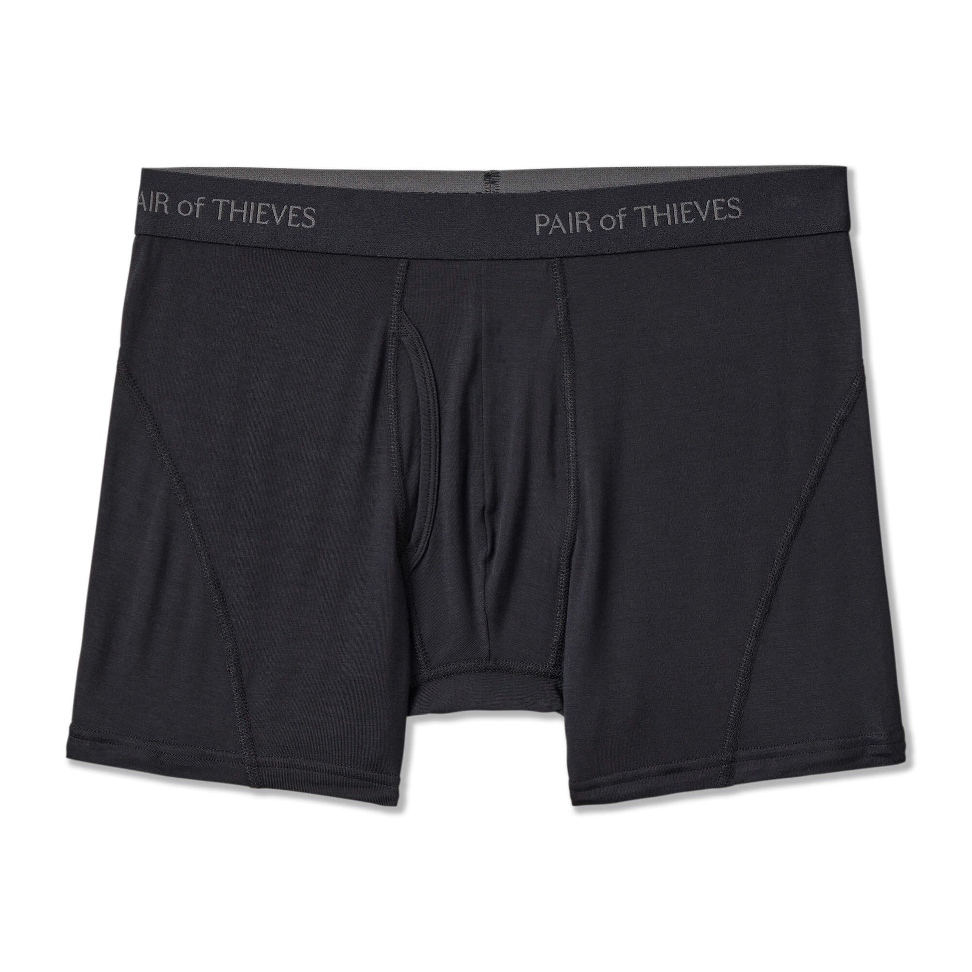 Black boxer briefs with 'Pair of Thieves' branding on a white background