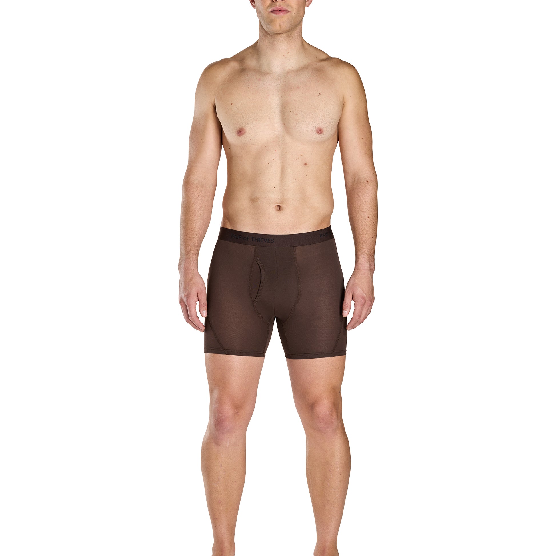 Man wearing brown boxer briefs on a white background