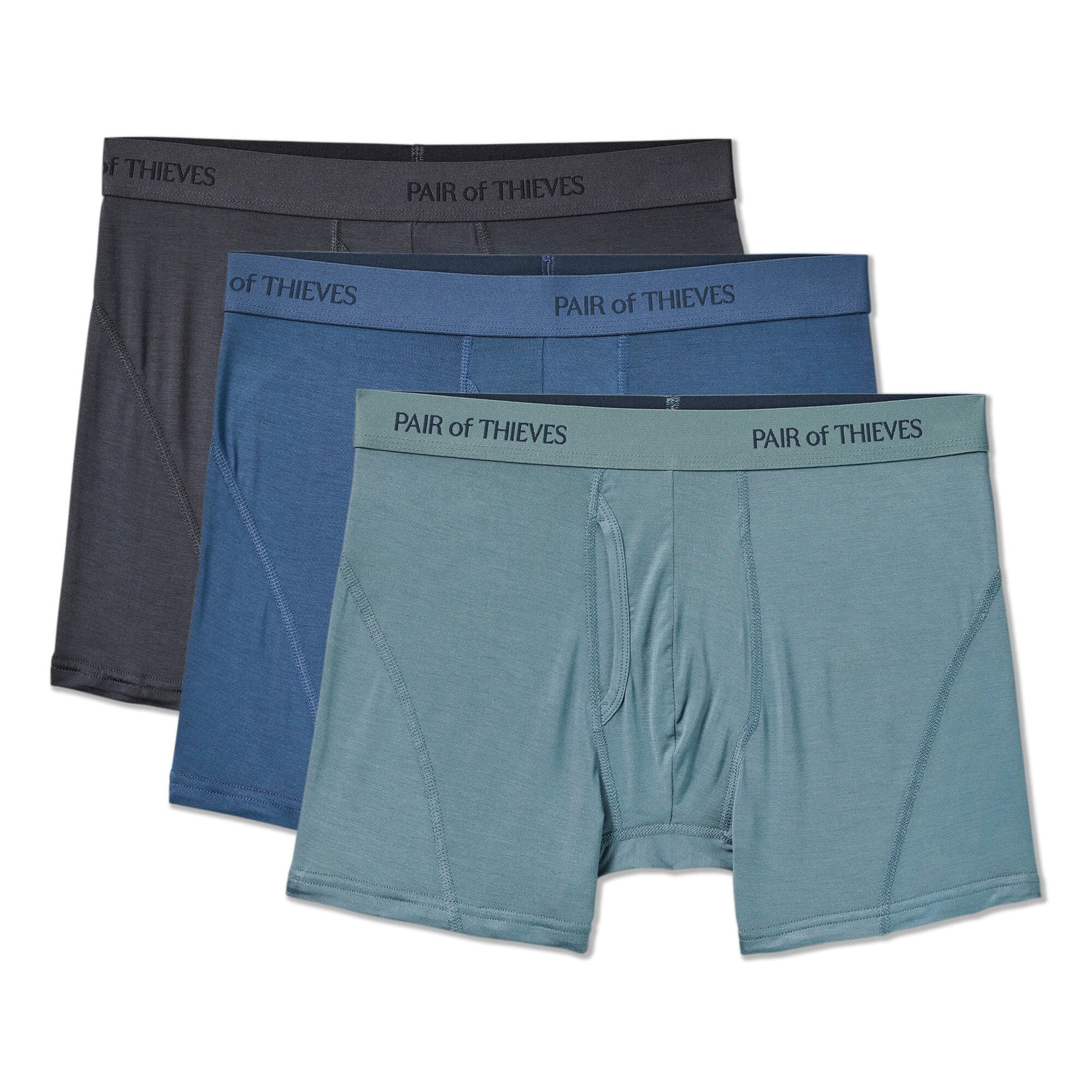Three pairs of men's boxer briefs in gray, blue, and green with 'Pair of Thieves' branding on a white background.