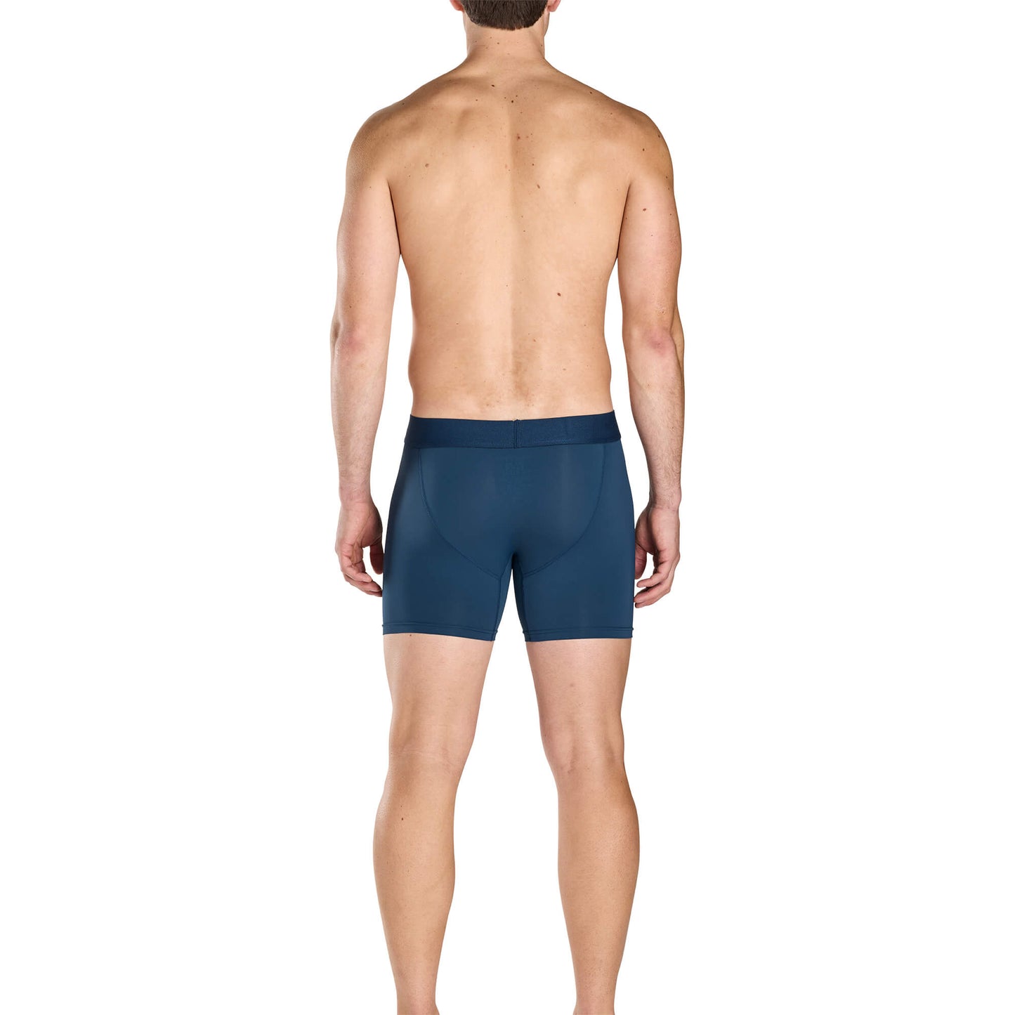 Man wearing blue SuperFit Pouch boxer briefs on a white background showing his back profile.