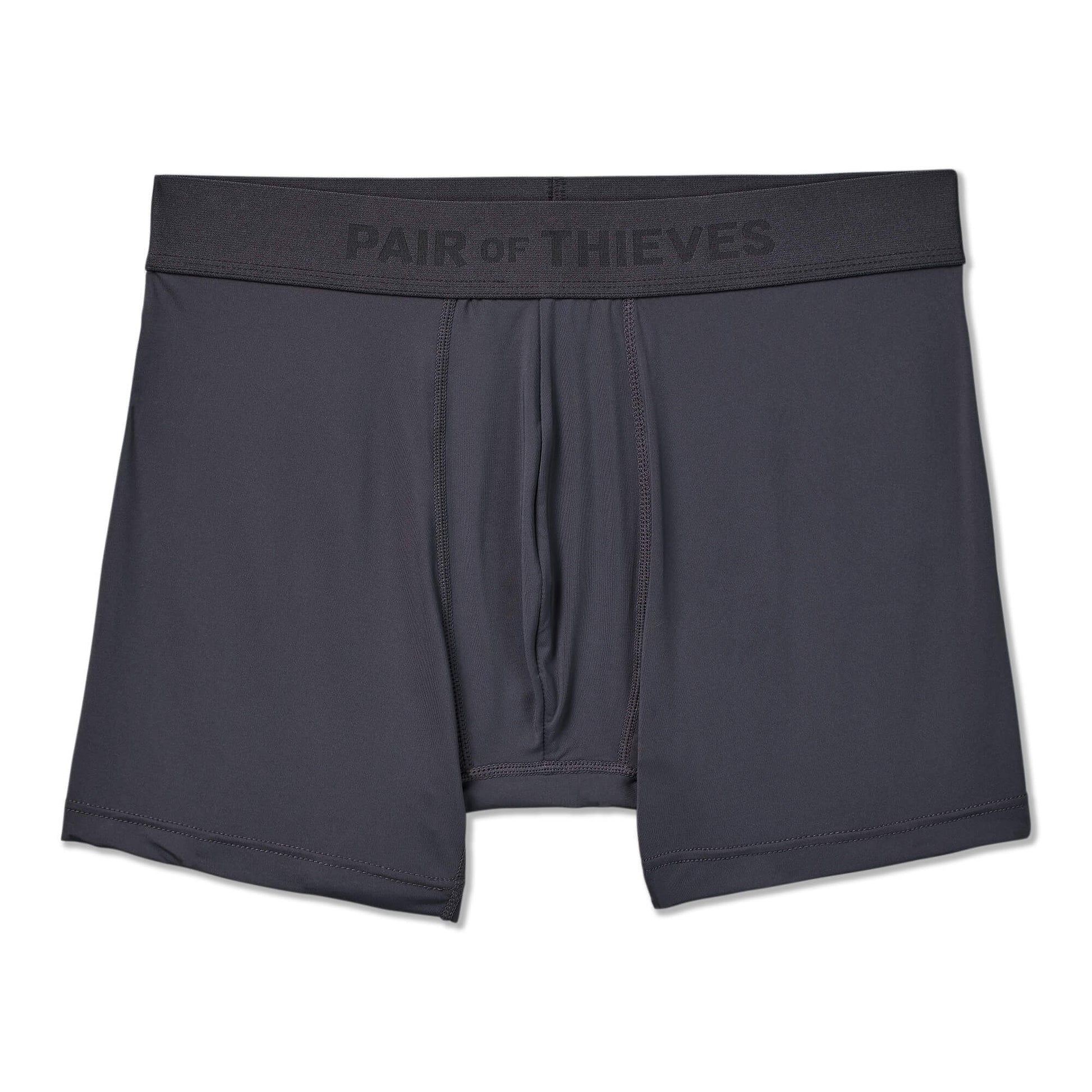 Green SuperFit Pouch boxer briefs with a black waistband on a white background