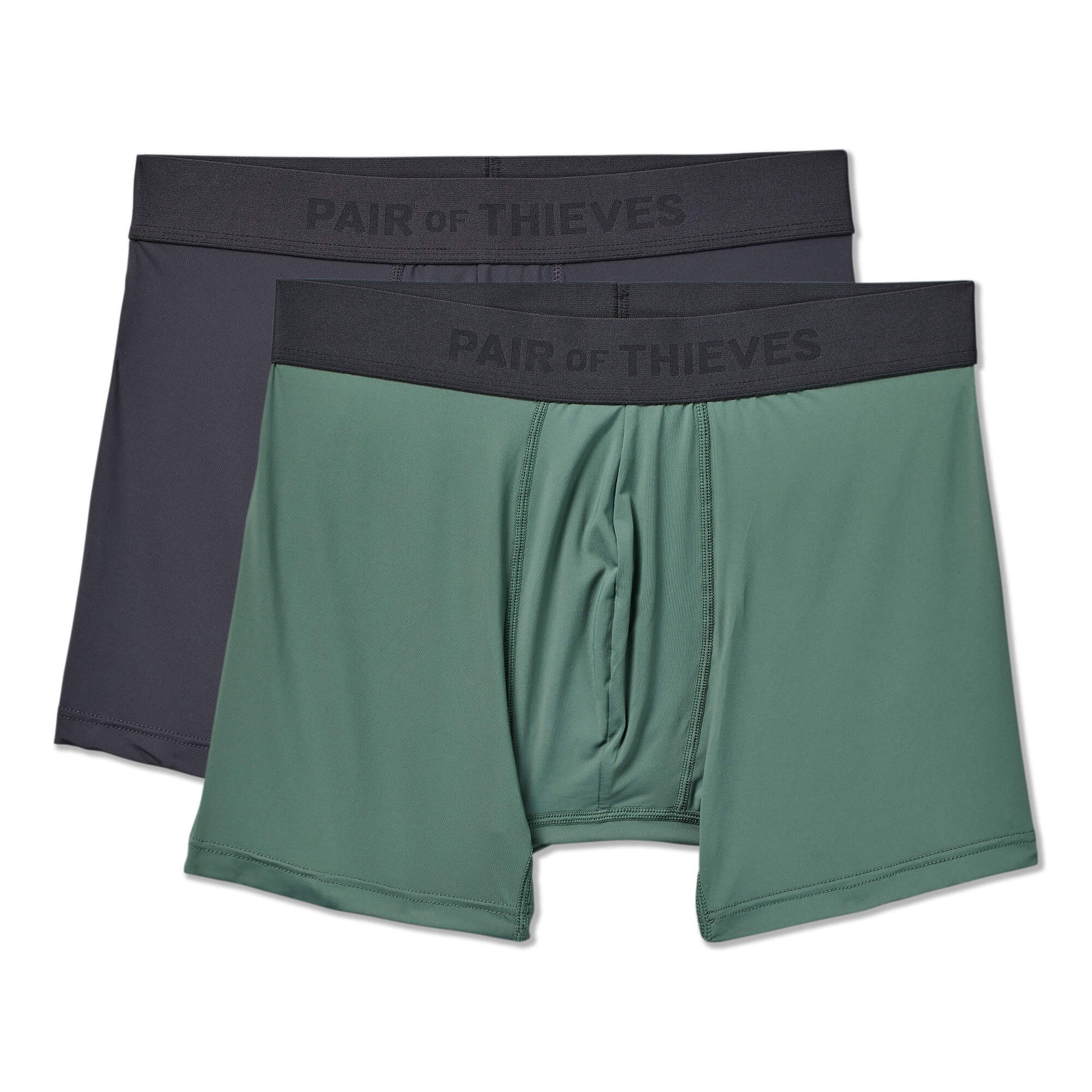 Two pairs of SuperFit Pouch (one black, one green)  underwear on a white background