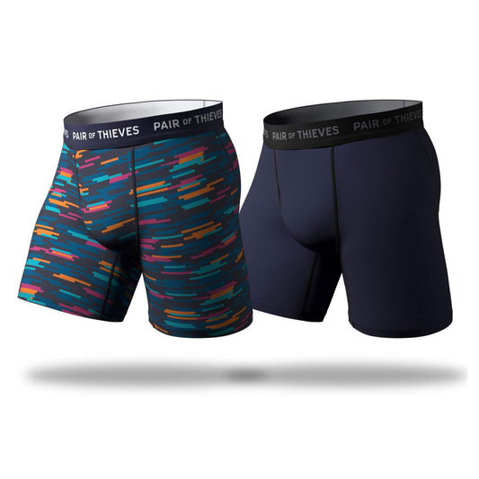 Two pairs of men's underwear with colorful and solid designs on a white background, branded 'Pair of Thieves'.