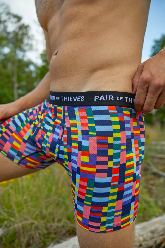 Close-up of SuperFit boxer briefs with detailed stitching on white background